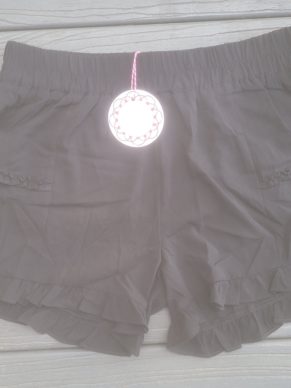 Umgee Black High-Waist Ruffle Hem Elastic Shorts